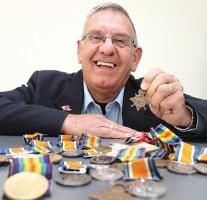 Nelson RSA President - Barry Pont, with the WW1 medals being returned to veteran's families.